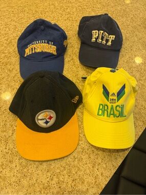 Various Caps including Pittsburgh Steelers Black and Gold Baseball Cap